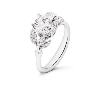 Eleganter Diamantring im Blütendesign, mit fein gearbeiteten Blattdetails, ideal für Natur- und Blumenliebhaber.