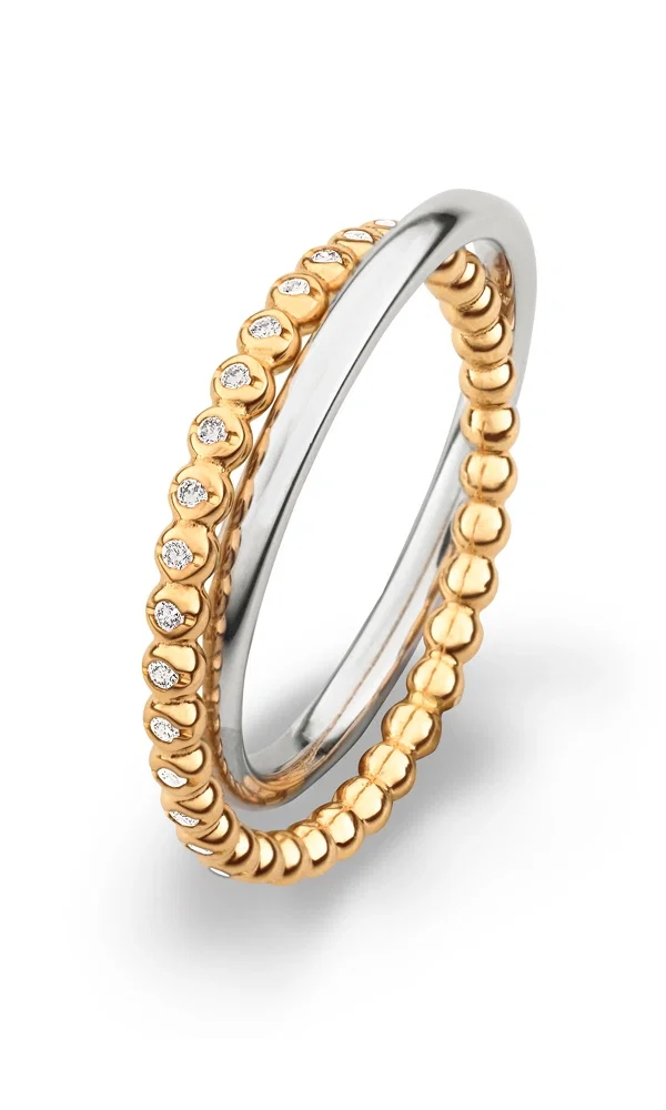 Eleganter Bicolor-Ring mit einer feinen Kugelstruktur in warmem Gelbgold, besetzt mit kleinen Diamanten. Die Kombination mit kühlem Weißgold schafft ein modernes und stilvolles Gesamtbild.