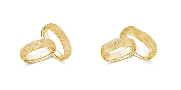 Zwei goldene Ringpaare von Manufaktur Giloy.