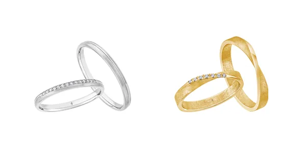 Zwei Ringpaare von Giloy in Weiß- und in Gelbgold.