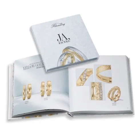 Hochzeitsring-Katalog mit Gelbgold-Trauringen und Diamantdetails – Inspiration für moderne Eheringe.